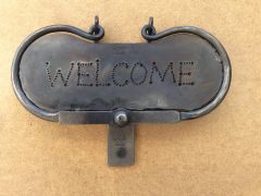 A welcome door knocker
